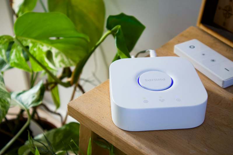 Family using secure smart home devices in living room