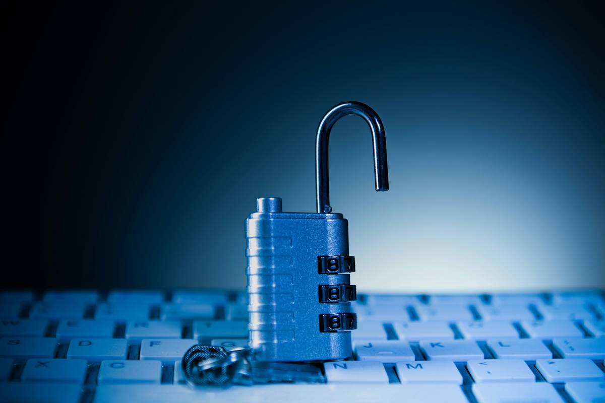 cyber awareness home wireless network: illustration showing a shield protecting home devices like laptops, phones, and smart speakers from hackers